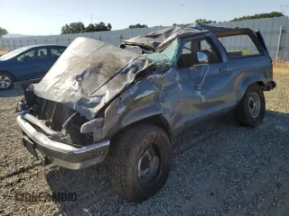 1989 Ford Bronco with VIN 1FMCU14T0KUA33910, listed as a Copart auction lot 57730195 with 53,335 mi miles and Salvage title. Bid and sale history available at DreamBid. Image 1.