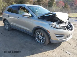 2015 Lincoln MKC z VIN 5LMCJ1A93FUJ26649, wystawiony jako IAAI lot #41832976 z przebiegiem 215 692 mil mil oraz . Historia ofert i sprzedaży dostępna na DreamBid. Obrazek 1.