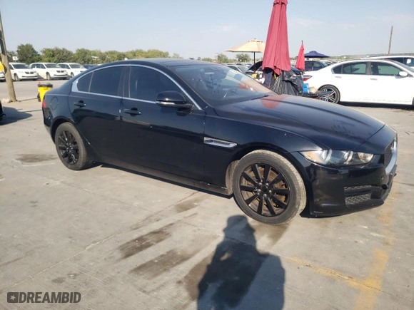 2019 Jaguar XE 25t with VIN SAJAR4FX7KCP44476, listed as a Copart auction lot 75512234 with 101,258 mi miles and Clean Title. Bid and sale history available at carsss.com. Image 4.