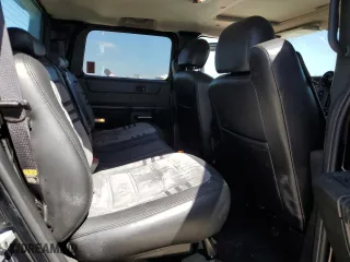 2005 Hummer H2 SUT with VIN 5GRGN22U65H113129, listed as a Copart auction lot 77315854 with 185,197 mi miles and Salvage Title. Bid and sale history available at carsss.com. Image 10.