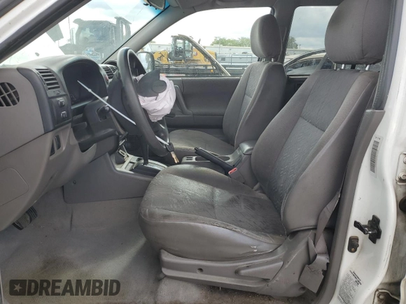 2004 Isuzu Rodeo S z VIN 4S2CK58W644300660, wystawiony jako Copart lot #54633785 z przebiegiem 375 845 mil mil oraz Szkoda całkowita • Salvage title. Historia ofert i sprzedaży dostępna na DreamBid. Obrazek 7.