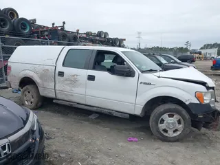 2013 Ford F-150 XL with VIN 1FTFW1CF7DFD53126, listed as a IAAI auction lot 41525709 with 136,137 mi miles. Bid and sale history available at carsss.com. Image 13.