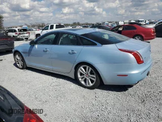 2014 Jaguar XJ with VIN SAJWA1CZ4E8V71167, listed as a Copart auction lot 43994545 with 69,682 mi miles and Salvage Title. Bid and sale history available at DreamBid. Image 2.