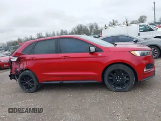 2020 Ford Edge SEL z VIN 2FMPK3J94LBB54068, wystawiony jako IAAI lot #41912225 z przebiegiem 83 528 mil mil oraz . Historia ofert i sprzedaży dostępna na DreamBid. Obrazek 13.