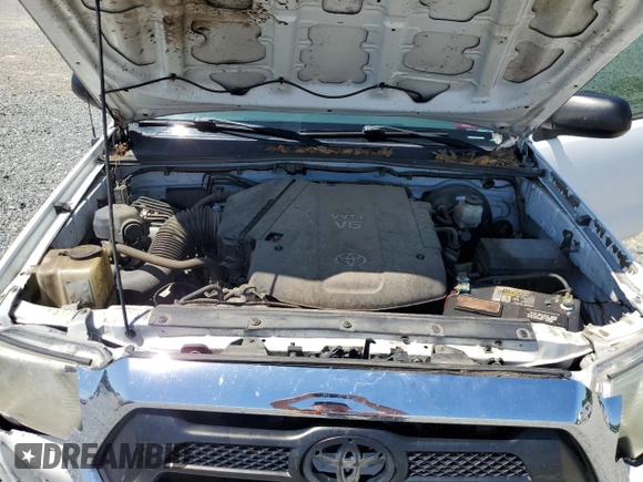 2015 Toyota Tacoma PreRunner with VIN 3TMJU4GNXFM180210, listed as a Copart auction lot 58169015 with 153,037 mi miles and Salvage title. Bid and sale history available at DreamBid. Image 11.