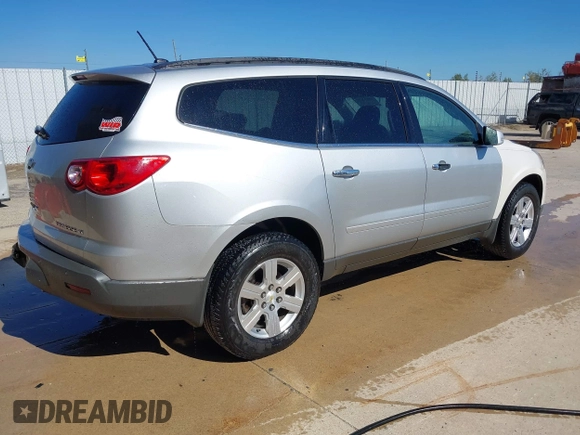 2012 Chevrolet Traverse 1LT with VIN 1GNKRGED5CJ370286, listed as a IAAI auction lot 40425141 with 125,280 mi miles and . Bid and sale history available at DreamBid. Image 4.