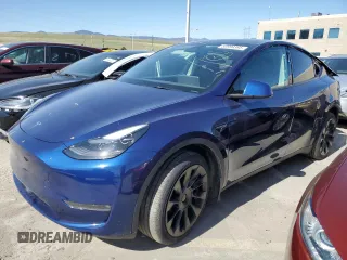 2023 Tesla Model Y Long Range with VIN 7SAYGAEE6PF689615, listed as a Copart auction lot 50999385 with 16,514 mi miles and Salvage Title. Bid and sale history available at DreamBid. Image 1.