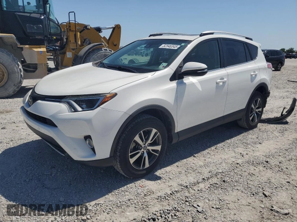 2018 Toyota RAV4 XLE with VIN 2T3WFREV7JW512949, listed as a Copart auction lot 52546345 with 41,558 mi miles and Salvage Title. Bid and sale history available at DreamBid. Image 1.