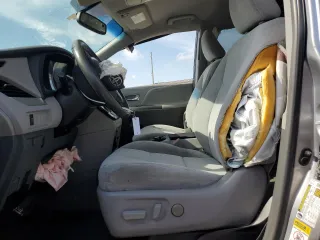2015 Toyota Sienna LE AAS with VIN 5TDKK3DC9FS560551, listed as a Copart auction lot 64053695 with 180,678 mi miles and Non repairable. Bid and sale history available at DreamBid. Image 7.