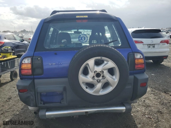 1998 Toyota RAV4 with VIN JT3HP10V5W0172067, listed as a Copart auction lot 84850544 with 316,659 mi miles and Salvage Title. Bid and sale history available at carsss.com. Image 6.
