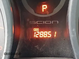 2015 Scion tC with VIN JTKJF5C7XFJ001662, listed as a IAAI auction lot 41843123 with 128,851 mi miles. Bid and sale history available at carsss.com. Image 15.
