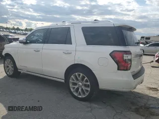 2019 Ford Expedition Platinum with VIN 1FMJU1MT6KEA23724, listed as a Copart auction lot 58489015 with 104,539 mi miles and Salvage title. Bid and sale history available at DreamBid. Image 2.