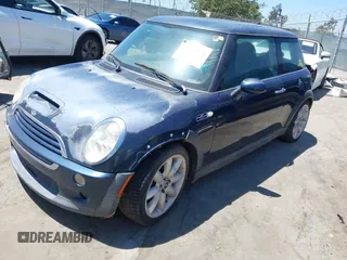 2006 MINI Hardtop S with VIN WMWRE33536TJ35740, listed as a IAAI auction lot 42720196 with 165,852 mi miles and . Bid and sale history available at DreamBid. Image 2.