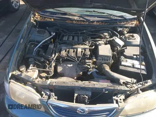 1998 Mazda 626 DX with VIN 1YVGF22C4W5768778, listed as a IAAI auction lot 41971066 with 119,168 mi miles. Bid and sale history available at carsss.com. Image 10.