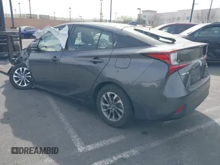 2020 Toyota Prius L Eco z VIN JTDKARFU9L3104882, wystawiony jako IAAI lot #41243035 z przebiegiem 29 013 mil mil oraz . Historia ofert i sprzedaży dostępna na DreamBid. Obrazek 3.