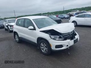 2013 Volkswagen Tiguan SEL with VIN WVGBV3AX6DW599881, listed as a IAAI auction lot 42272106 with 103,009 mi miles and . Bid and sale history available at DreamBid. Image 1.