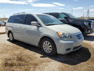 2010 Honda Odyssey EX-L with VIN 5FNRL3H76AB025439, listed as a Copart auction lot 50602055 with 145,543 mi miles and Salvage Title. Bid and sale history available at DreamBid. Image 4.