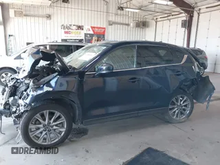 2020 Mazda CX-5 Grand Touring with VIN JM3KFBDM8L0781491, listed as a IAAI auction lot 39788385 with 57,316 mi miles and . Bid and sale history available at carsss.com. Image 14.