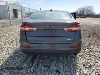 2020 Ford Fusion SEL z VIN 3FA6P0CD8LR138190, wystawiony jako Copart lot #49266445 z przebiegiem 145 381 mil mil oraz Szkoda całkowita • Salvage title. Historia ofert i sprzedaży dostępna na DreamBid. Obrazek 6.