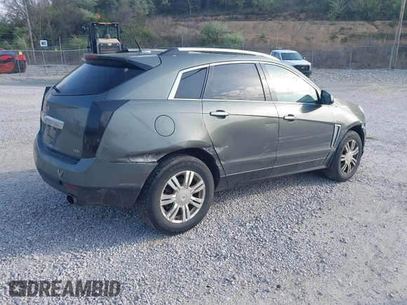 2013 Cadillac SRX Luxury Collection with VIN 3GYFNCE31DS587415, listed as a IAAI auction lot 42020500 with 279,638 mi miles and . Bid and sale history available at DreamBid. Image 4.