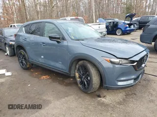 2021 Mazda CX-5 Touring with VIN JM3KFBCM5M0332644, listed as a IAAI auction lot 41083205 with 36,105 mi miles. Bid and sale history available at carsss.com. Image 1.
