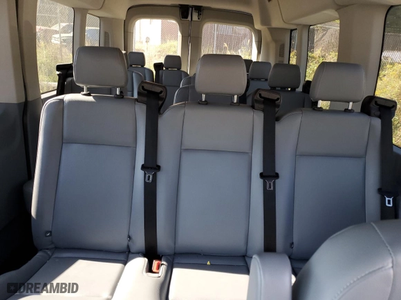 2016 Ford Transit Wagon XL with VIN 1FBAX2CM3GKA53692, listed as a Copart auction lot 77101654 with 61,432 mi miles and Salvage Title. Bid and sale history available at carsss.com. Image 10.