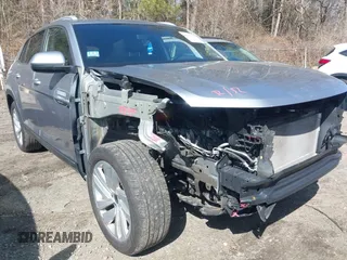 2020 Volkswagen Atlas SE with VIN 1V26E2CAXLC229119, listed as a IAAI auction lot 41932770 with 124,871 mi miles and . Bid and sale history available at DreamBid. Image 1.