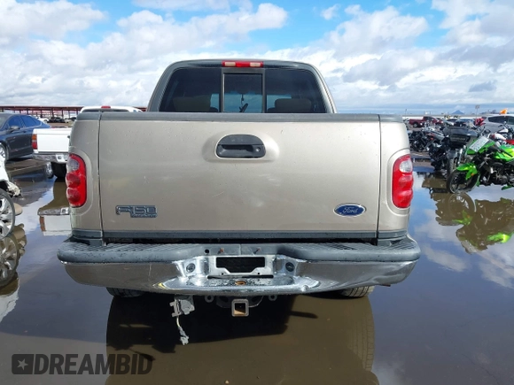 2003 Ford F-150 XLT with VIN 1FTRW07L53KD82167, listed as a IAAI auction lot 41745801 with 216,783 mi miles. Bid and sale history available at carsss.com. Image 16.