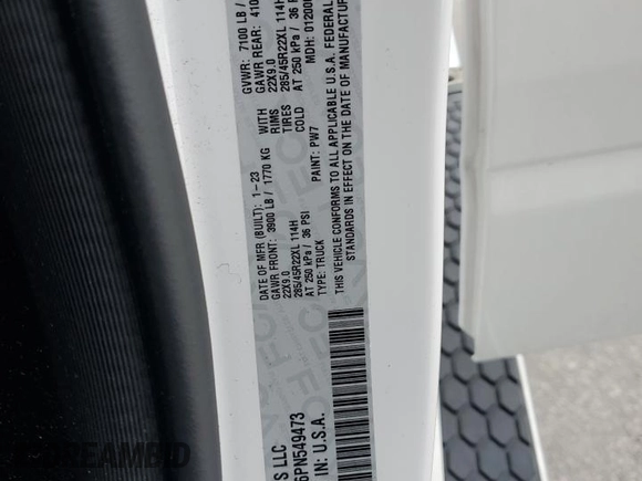 2023 Ram 1500 Longhorn with VIN 1C6SRFKT6PN549473, listed as a Copart auction lot 54166445 with 45,676 mi miles and Salvage title. Bid and sale history available at DreamBid. Image 12.