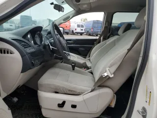 2012 Dodge Grand Caravan SXT with VIN 2C4RDGCG6CR204681, listed as a Copart auction lot 80799044 with 183,195 mi miles and Salvage Title. Bid and sale history available at DreamBid. Image 7.