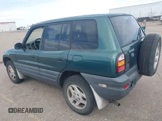 1998 Toyota RAV4 with VIN JT3GP10V5W0026814, listed as a IAAI auction lot 42003456 with 196,842 mi miles and . Bid and sale history available at DreamBid. Image 3.