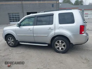 2011 Honda Pilot Touring with VIN 5FNYF4H90BB022354, listed as a IAAI auction lot 41965082 with 126,505 mi miles and . Bid and sale history available at carsss.com. Image 15.