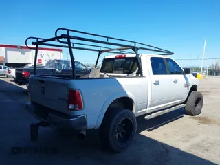 2014 Ram 2500 Laramie with VIN 3C6UR5FL0EG121515, listed as a IAAI auction lot 41859142 with 225,048 mi miles. Bid and sale history available at carsss.com. Image 4.