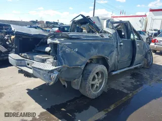 2004 Nissan Titan LE with VIN 1N6AA07B54N565729, listed as a IAAI auction lot 41813726 with 168,029 mi miles. Bid and sale history available at carsss.com. Image 4.