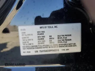 2023 Tesla Model Y Long Range with VIN 7SAYGAEE0PF642810, listed as a Copart auction lot 52181655 with 74,922 mi miles and Salvage Title. Bid and sale history available at DreamBid. Image 14.