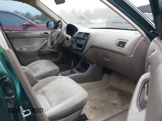 2000 Honda Civic VP with VIN 2HGEJ6615YH603265, listed as a IAAI auction lot 40861514 with 186,694 mi miles. Bid and sale history available at carsss.com. Image 5.