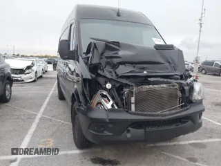 2015 Mercedes-Benz Sprinter Cargo with VIN WD3PE7CC7FP158991, listed as a IAAI auction lot 41798051 with 128,817 mi miles. Bid and sale history available at carsss.com. Image 1.