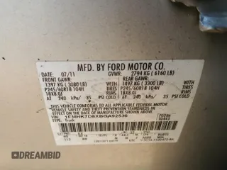2011 Ford Explorer XLT z VIN 1FMHK7D8XBGA92536, wystawiony jako Copart lot #52979635 z przebiegiem 260 753 mil mil oraz Szkoda całkowita • Salvage title. Historia ofert i sprzedaży dostępna na DreamBid. Obrazek 14.