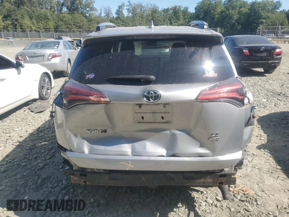 2017 Toyota RAV4 LE with VIN 2T3BFREV5HW595953, listed as a Copart auction lot 70185914 with 82,641 mi miles and Salvage Title. Bid and sale history available at carsss.com. Image 6.