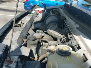 2011 Ford Econoline Cargo Commercial with VIN 1FTNE2EL2BDB32047, listed as a IAAI auction lot 43218450 with 123,619 mi miles and . Bid and sale history available at DreamBid. Image 13.