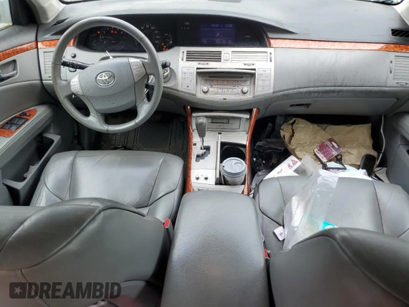 2007 Toyota Avalon XL z VIN 4T1BK36B97U209376, wystawiony jako Copart lot #60779405 z przebiegiem 189 776 mil mil oraz Czysty tytuł • Clean title. Historia ofert i sprzedaży dostępna na DreamBid. Obrazek 8.