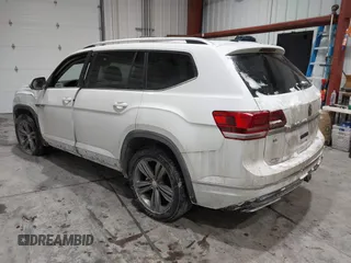 2019 Volkswagen Atlas SE z VIN 1V2XR2CA0KC595596, wystawiony jako IAAI lot #41410019 z przebiegiem 103 336 mil mil oraz . Historia ofert i sprzedaży dostępna na DreamBid. Obrazek 3.