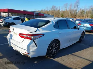 2018 Toyota Camry LE with VIN 4T1B11HK5JU565402, listed as a IAAI auction lot 41824110 with 105,659 mi miles. Bid and sale history available at carsss.com. Image 4.