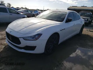 2019 Maserati Ghibli with VIN ZAM57XSAXK1338255, listed as a Copart auction lot 81404883 with Not Provided miles. Bid and sale history available at carsss.com. Image 1.
