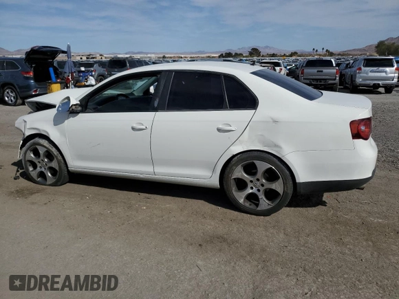 2009 Volkswagen Jetta S with VIN 3VWJZ71K99M059879, listed as a Copart auction lot 47478145 with 154,359 mi miles and Salvage title. Bid and sale history available at DreamBid. Image 2.