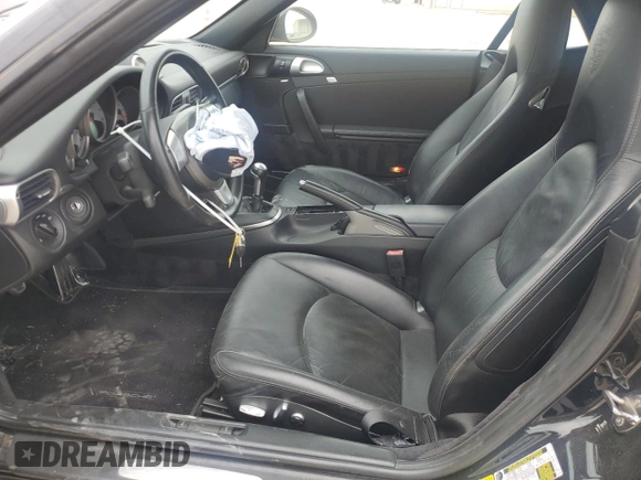 2009 Porsche 911 Carrera S with VIN WP0CB29959S755831, listed as a Copart auction lot 47064005 with 114,522 mi miles and Salvage title. Bid and sale history available at DreamBid. Image 7.