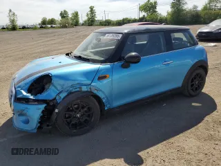 2017 MINI Hardtop Cooper with VIN WMWXP5C33H2G60921, listed as a Copart auction lot 58139295 with 94,599 mi miles and Salvage title. Bid and sale history available at DreamBid. Image 1.