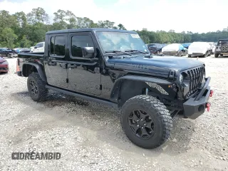 2023 Jeep Gladiator Sport S with VIN 1C6HJTAG9PL525183, listed as a Copart auction lot 54556735 with 13,805 mi miles and Salvage title. Bid and sale history available at DreamBid. Image 4.