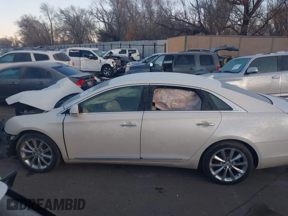 2014 Cadillac XTS Premium with VIN 2G61P5S30E9123057, listed as a IAAI auction lot 41301457 with 123,042 mi miles and . Bid and sale history available at DreamBid. Image 14.