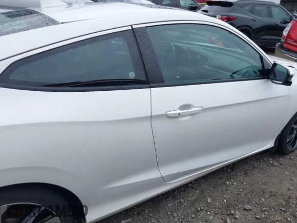 2018 Honda Civic Si z VIN 2HGFC3A52JH751998, wystawiony jako IAAI lot #42415499 z przebiegiem 58 088 mil mil oraz . Historia ofert i sprzedaży dostępna na DreamBid. Obrazek 13.